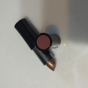 Mary Kay lipstick golden color. Has the wrong color on the shaded lid.